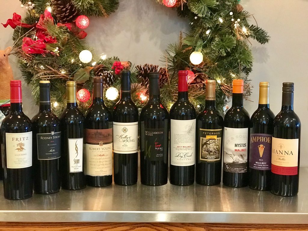 Selection of Malbecs from the Wine Road lined up on a counter