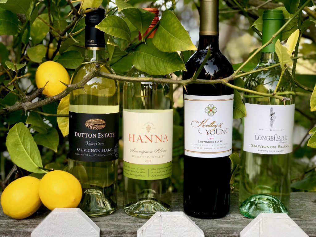 Sauvignon Blanc bottles with lemon tree in background