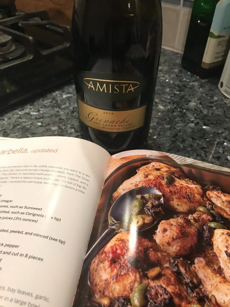 Recipe book with chicken marabella sn bottle of Amista Grenache