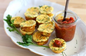 sample quiches with tomato jam on top