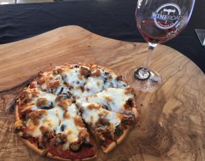 Pizza with a Wine Road wine glass from 2018 Wine & Food Affair