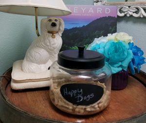 Fun image of dog lamp and a container of dog treats labeled Happy Dog.