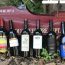 Zinfandel bottles lined-up against a toy fire truck