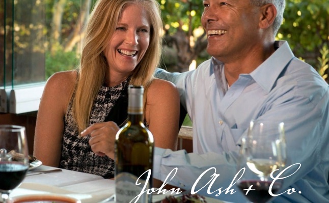 Man and woman at table enjoying wine and dinner at John Ash and Company at Vintners Inn